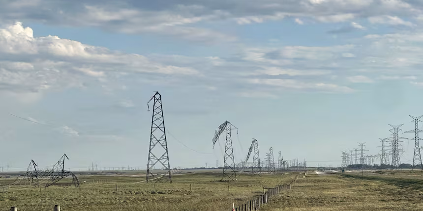 A storm in 2025 damaged transmission towers and lines in Southeastern Alberta. Photo sourced from CBC News, originally submitted by Dennis Van Nieuwkerk
